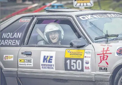  ?? SUBMITTED, PHOTO BY CHELSEY LAWRENCE ?? Jason Nolan smiles from his navigator seat during the Targa Bambina road rally over the Canada Day long weekend on the Burin Peninsula.