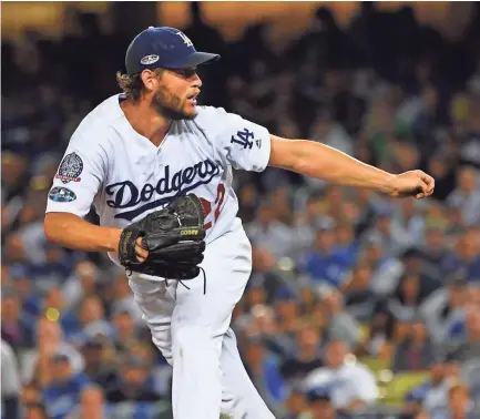  ?? JAYNE ?? Dodgers ace Clayton Kershaw pitched eight scoreless innings and struck out three in shutting down the Braves 3-0. KAMIN-ONCEA/USA TODAY SPORTS