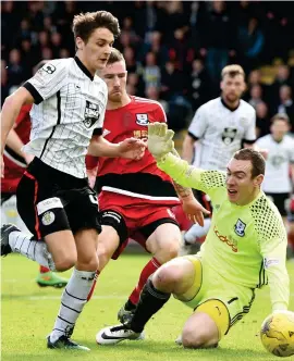  ?? Photograph: SNS ?? Kyle Magennis scores St Mirren’s fourth goal