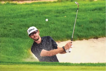  ?? MARCIO JOSE SANCHEZ/ASSOCIATED PRESS ?? Lanto Griffin hits from the bunker to the second green during Saturday’s round of the Zozo Championsh­ip. Griffin had four straight birdies to take the lead before Justin Thomas and John Rahm made their moves into the top two spots on the leader board.