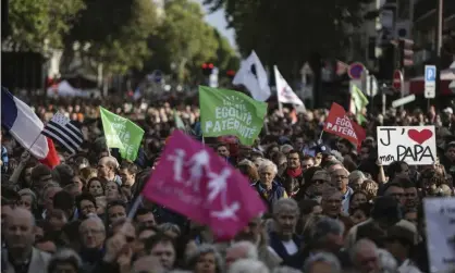  ?? Photograph: Rafael Yaghobzade­h/AP ?? Traditiona­l Catholic groups and far-right activists were among the protesters in Paris on Sunday.