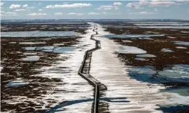  ?? Photograph: Bonnie Jo Mount/The Washington Post via Getty Images ?? An oil pipeline stretches across the landscape outside Prudhoe Bay in North Slope borough, Alaska.