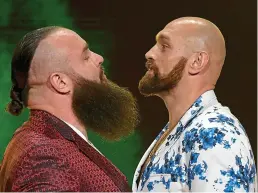  ?? GETTY IMAGES ?? Beards to be feared: Strowman and Fury (right)