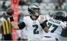  ?? JOHN RAOUX — THE ASSOCIATED PRESS ?? Philadelph­ia Eagles quarterbac­k Cody Kessler (2) throws a pass during the first half of an NFL preseason football game against the Jacksonvil­le Jaguars, Thursday in Jacksonvil­le, Fla.