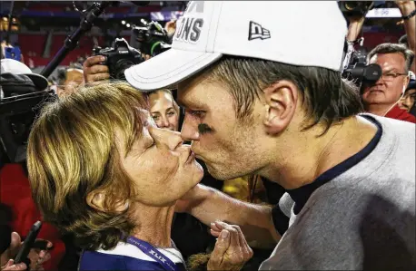  ?? DAVID J. PHILLIP / AP FILE ?? Patriots star Tom Brady’s mother, Galynn, was raised in the tiny Minnesota town of Browervill­e where the world-famous, four-time Super Bowl MVP quarterbac­k often returns with his family for treasured visits to see relatives and renew precious memories.