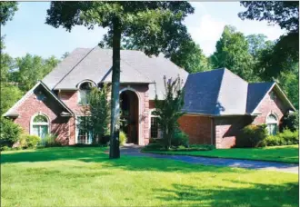 ?? CODY GRAVES/Arkansas Democrat-Gazette ?? This home, located at 541 Silverwood Trail in North Little Rock, has about 5,100 square feet and is listed for $499,000 with Kerry Dare of Crye-Leike Realtors, North Little Rock. Today’s open house is from 2 to 4 p.m. For more informatio­n, call Dare at...