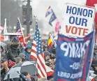  ?? JASPER COLT/ USA TODAY ?? Protests began Tuesday in the capital with thousands of pro- Trump and far- right demonstrat­ors who will continue to march Wednesday. More on Page 2A.