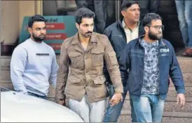  ?? SANJEEV VERMA/HT PHOTO ?? Actor Deep Sidhu in custody of Delhi Police special cell sleuths following his arrest from Karnal bypass on Monday night.