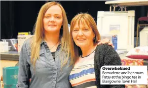  ??  ?? Overwhelme­d Bernadette and her mum Patsy at the bingo tea in Blairgowri­e Town Hall