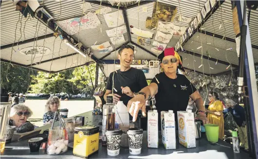  ?? BRADEN FASTIER/STUFF ?? “It’s a wonderful community,” says Joker Espresso coffee cart owner Tracy Alexander, pictured with assistant Lawry Trewavas.