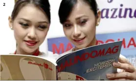  ??  ?? 2 1 Being connected to the Internet makes it easier for passengers travelling on business to get their work done. — Malindo air
2 the newly launched MalindoMag is an interestin­g read, with a good selection of features. — SaMuel Ong/ the Star