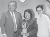  ??  ?? President Macadaeg and UCPB First Vice President and Human Resources Group Head Stella Maria A. Fulgencio together with People Management Associatio­n of the Philippine­s President Michelle C. Garcia during the PMAP Awarding Ceremony.