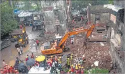  ?? ?? Rescue operations underway on Tuesday after 19 people died and 33 others were injured when a four-storey building collapsed at Naik Nagar, Kurla (East) on late Monday night.