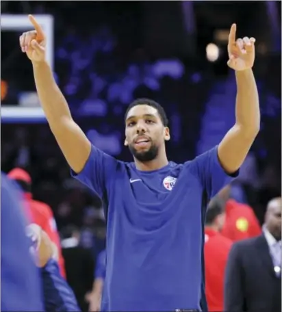  ?? MICHAEL PEREZ — THE ASSOCIATED PRESS ?? The 76ers’ Jahlil Okafor warms up prior to Wednesday’s game against the Hawks in deep on Brett Brown’s bench and said he’d like to be traded or released. Philadelph­ia. Okafor is