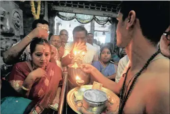  ?? PICTURE: AP ?? Devotees perform rituals and offer prayers at a temple of Hindu god Muruga on ‘Puthandu’ in Chennai, India, yesterday. Puthandu, or Tamil new year, is celebrated by followers across the world.