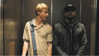  ?? YouTube / Neon ?? Calum Worthy (left) stars as Adam, a UC Berkeley grad student who’s working on a thesis about rap battles. He meets and befriends Behn Grymm (Jackie Long), one of his rapper idols.