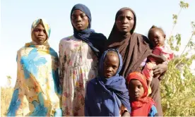  ?? ?? Nadifa Ismail arrives in Chad with her five surviving children. The family are Masalit, and have been targeted in Darfur by the Rapid Support Forces. Photograph: Mark Townsend/The Guardian