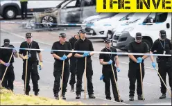  ??  ?? PAINSTAKIN­G SEARCH FOR CLUES Police officers and forensics at the scene in Caithness Street, Blantyre, where Kermit was shot on Monday night