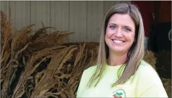  ?? TERRY CODY/THREE RIVERS EDITION ?? Leslie Odom, co-owner of Holland Bottom Farm, is committed to learning the ins and outs of agricultur­e and helping her family farm grow via social-media marketing.