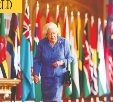  ?? STEVE PARSONS/POOL/AFP VIA GETTY IMAGES ?? Queen Elizabeth, seen walking through St. George's Hall at Windsor Castle this week, still retains the affection of much of the British public, but Sunday's interview with Harry and Meghan may have done damage to the royal brand.