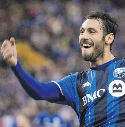  ?? GRAHAM HUGHES/THE CANADIAN PRESS ?? Matteo Mancosu scored the opening goal and the Montreal Impact were celebratin­g early in their home opener at Olympic Stadium against the Seattle Sounders Saturday, but they were less than enthusiast­ic after Seattle scored in extra time to tie the match.