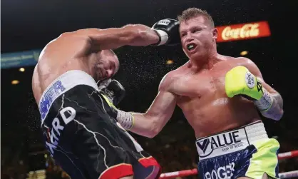 ??  ?? Canelo Álvarez, left, lands on Sergey Kovalev during Saturday’s light heavyweigh­t title fight.Photograph: John Locher/AP
