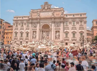  ?? ANDREW MEDICHINI/AP ?? After three years of pandemic limitation­s, tourism is expected to exceed 2019 records in some of Europe’s most popular destinatio­ns this summer, including Rome.
