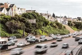  ?? Gabrielle Lurie/The Chronicle ?? Traffic moves on Highway 101 in San Francisco. Toll-based express lanes between I-380 in South San Francisco and Whipple Avenue in Redwood City are open.