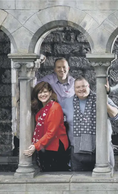  ??  ?? The Paisley 2021 For City of Culture bid team photograph­ed in the cloisters at Paisley Abbey. The