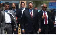  ?? AP/EMRE TAZEGUL ?? Philip Kosnett (center), the U.S. Embassy’s charge d’affaires in Ankara, Turkey, leaves a prison complex in Aliaga after attending the trial Wednesday of jailed American pastor Andrew Brunson.