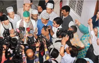  ?? PIC/NAVEEN SHARMA ?? Nazim Nizami talks to mediaperso­ns at the residence on Monday, while his uncle Syed Ali Nizami looks on