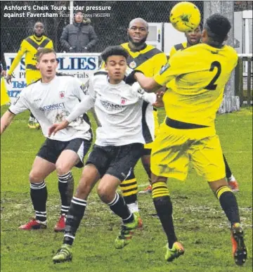  ?? Picture: Chris Davey FM5037411 ?? Ashford’s Cheik Toure under pressure against Faversham