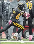  ?? FRANK GUNN THE CANADIAN PRESS FILE PHOTO ?? Brandon Banks is one of 10 surviving Ticats who knows about Grey Cup runs. Here he runs up field on a 107-yard TD return against Montreal Oct. 26, 2013, in Guelph.