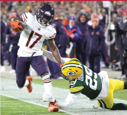  ?? STACY REVERE/GETTY IMAGES ?? Receiver/return man Jakeem Grant evades Packers cornerback Rasul Douglas to score in the second quarter.