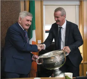  ??  ?? BELOW: Mick O’Dwyer in suitably happy pose as he listens to speeches during the civic reception in his honour.