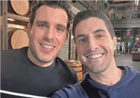  ?? PROVIDED BY NICHOLAS MAGGIPINTO AND COREY BRISKIN ?? Nicholas Maggipinto, left, and Corey Briskin have filed a class action lawsuit against the City of New York for allegedly violating gay men’s civil and constituti­onal rights by denying them in-vitro fertilizat­ion benefits.