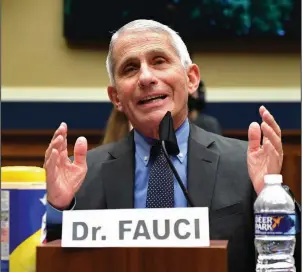  ?? (AP/Kevin Dietsch) ?? In his testimony to lawmakers Tuesday, Dr. Anthony Fauci painted a darker picture of the coronaviru­s threat than President Donald Trump has presented.