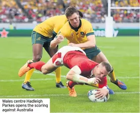  ??  ?? Wales centre Hadleigh Parkes opens the scoring against Australia