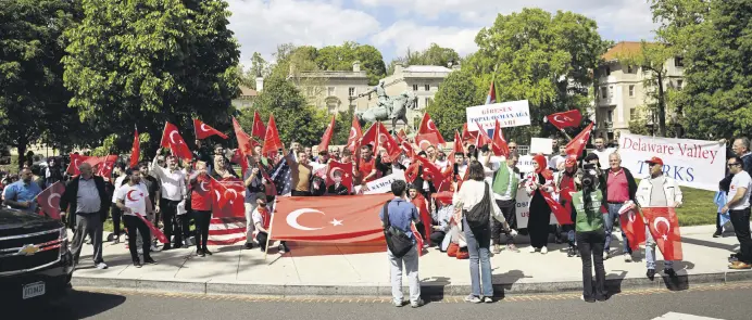  ?? ?? Demonstrat­ors carrying Turkish flags and banners protest Armenian “genocide” claims at a rally in Washington D.C., U.S., April 25, 2024.