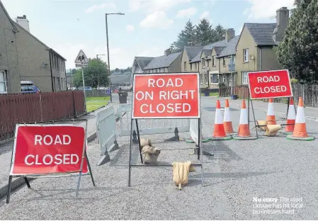  ??  ?? No entry The road closure has hit local businesses hard