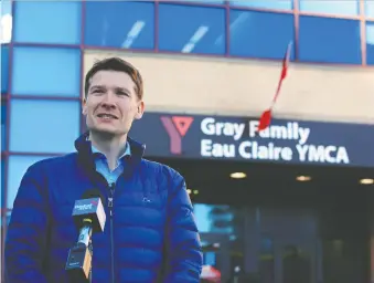  ?? GAVIN YOUNG ?? Calgary Ward 11 Coun. Jeromy Farkas speaks about his notice of motion calling on city council to enter talks with the YMCA to save the Eau Claire YMCA on Wednesday. Farkas is also running for mayor.