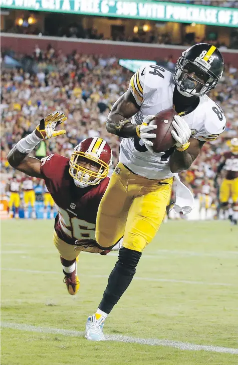  ?? — THE ASSOCIATED PRESS ?? Pittsburgh Steelers wide receiver Antonio Brown heads to the end zone as Washington Redskins cornerback Bashaud Breeland attempts to get back in the play.