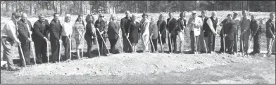  ?? Brittany Williams/News-Times ?? Groundbrea­king: State representa­tives, South Arkansas Community College adminstrat­ors, donors and industry partners mark a new beginning at the ground breaking for the college’s Advanced Manufactur­ing Training Center.