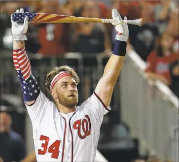  ?? Alex Brandon Associated Press ?? WITH ONLY a few days left before spring-training camps open, outfielder Bryce Harper is still unattached.