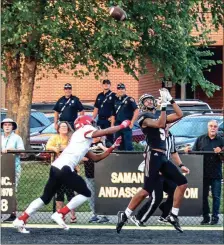  ??  ?? ( LEFT) Calhoun’s Luke Moseley (right) hauls in a touchdown pass during last Friday’s game against Therrell. ( RIGHT) Sonoravill­e’s Case Collins (12) tries to break a tackle against Model on Aug. 17.