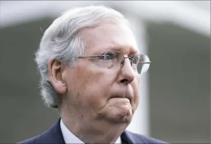  ?? Alex Brandon/Associated Press ?? Senate Majority Leader Mitch McConnell, R-Ky., fields a question from reporters Tuesday after he and other Senate Republican­s met with President Donald Trump at the White House.