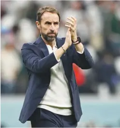  ?? A g ence France-presse ?? England’s coach Gareth Southgate returns from the field after their match against US on Friday.