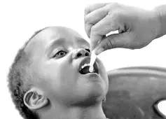  ?? — Reuters photo ?? A child receives a cholera vaccine at a clinic in Harare, Zimbabwe.