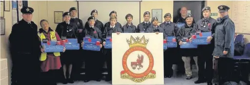  ??  ?? Staff and Cadets of 418 (Aberconwy) Sqn preparing to take to the streets to collect for the Poppy Appeal