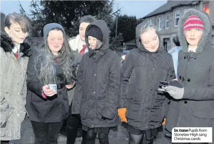  ??  ?? In tune Pupils from Stonelaw High sang Christmas carols